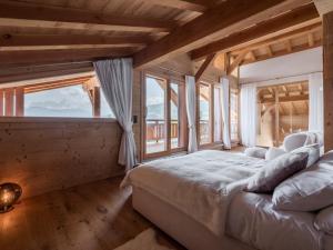 Villas Chalet avec piscine et vue panoramique : photos des chambres