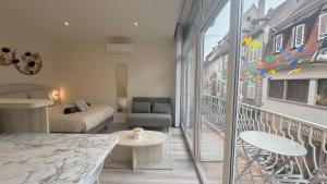 Appartements Au Petit Bonheur - Studio - Centre ville : photos des chambres