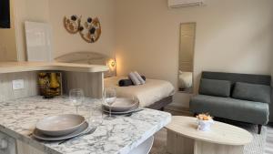 Appartements Au Petit Bonheur - Studio - Centre ville : photos des chambres