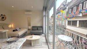 Appartements Au Petit Bonheur - Studio - Centre ville : photos des chambres