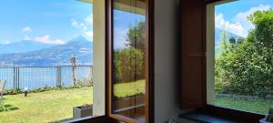 Villa Gli Ulivi - Ushuaia Apartment Lake & Garden View - Free Parking