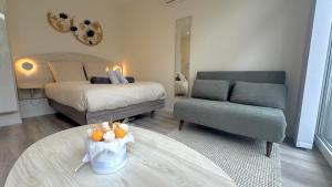 Appartements Au Petit Bonheur - Studio - Centre ville : photos des chambres