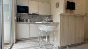 Appartements Au Petit Bonheur - Studio - Centre ville : photos des chambres