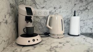 Appartements Au Petit Bonheur - Studio - Centre ville : photos des chambres