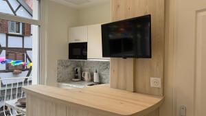 Appartements Au Petit Bonheur - Studio - Centre ville : photos des chambres