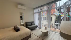 Appartements Au Petit Bonheur - Studio - Centre ville : photos des chambres