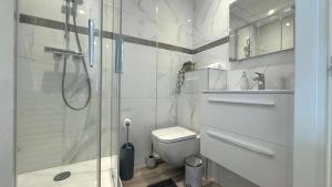 Appartements Au Petit Bonheur - Studio - Centre ville : photos des chambres