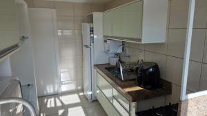 Lindo apartamento frente mar na Prainha com Ar Condicionado, Piscina