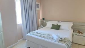 Lindo apartamento frente mar na Prainha com Ar Condicionado, Piscina