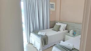Lindo apartamento frente mar na Prainha com Ar Condicionado, Piscina