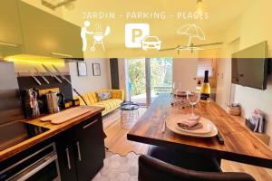Appartements La Pause de Merimee - Jardin - Parking : photos des chambres