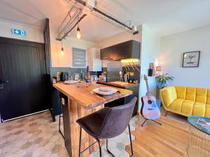 Appartements La Pause de Merimee - Jardin - Parking : photos des chambres