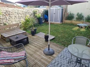 Appartements Suite deluxe avec jacuzzi et jardin a 2 min de la plage : photos des chambres