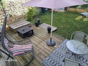 Appartements Suite deluxe avec jacuzzi et jardin a 2 min de la plage : photos des chambres
