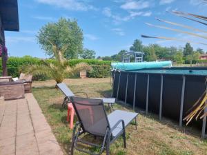 Appartements Gite des Lauriers Roses - Piscine collective, Spas et jardins prives - 7 kms de la plage de Lespecier : photos des chambres