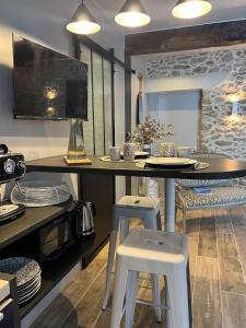 Appartements L-Echoppe - Charmant studio au coeur de Clisson : photos des chambres