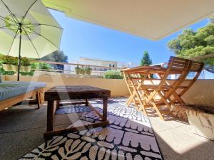 T2 moderne avec terrasse, WiFi et place de parking