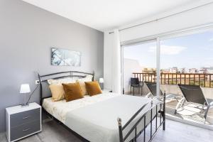 Bright & Elegant Duplex with Terrace and Pool, Just Steps from Puerto Colón