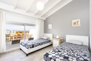 Bright & Elegant Duplex with Terrace and Pool, Just Steps from Puerto Colón