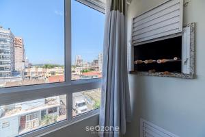 Apto Charmoso a 550m da Praia Perequê - RNE0301