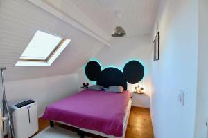 Appartements Maison WonderLodge - Deco Disney - Jeux pour tous - Proche Disney et Paris : photos des chambres