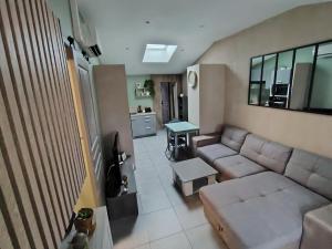 Appartements Ni 100%Gite,Ni100% loc chez Kheira&Pascal : photos des chambres
