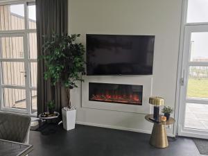 Marina Strandbad Chalet Aan het Oever mit Zaun Haus Nr 135