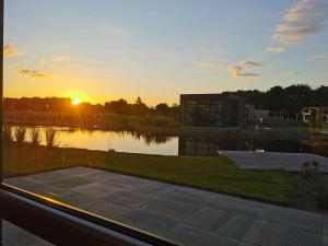 Marina Strandbad Chalet Aan het Oever mit Zaun Haus Nr 135