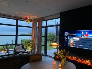 Enkhuizer Strand Chalet Asami San Erste Reihe mit Zaun Haus Nr 262