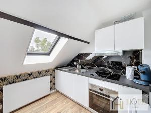 Appartements Appartement Douillet Dernier Etage Calme - Wi-Fi : photos des chambres