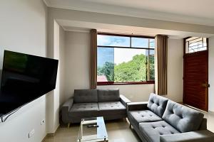 Vive a 5min centro 2HAB con AC Terraza y Parrilla