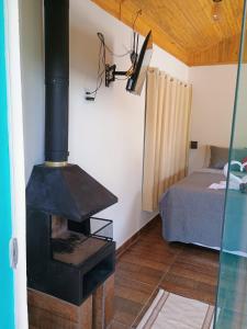 Chalé Som do Riacho e Chalé Riacho Sereno, com Hidromassagem e Lareira á 20 minutos de Gonçalves-MG