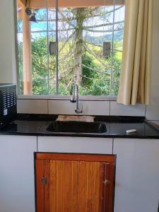 Chalé Som do Riacho e Chalé Riacho Sereno, com Hidromassagem e Lareira á 20 minutos de Gonçalves-MG