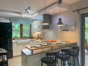 Ostoja Dziarnówko - willa z ogrodem na Mazurach