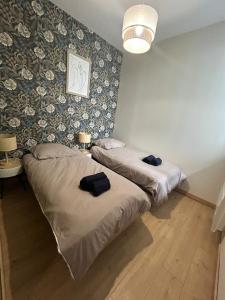 Appartements Jardin Secret - Lourdes : photos des chambres