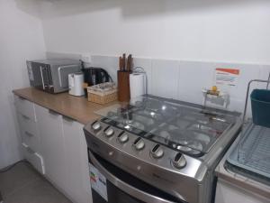 Departamento primer piso a 5 minutos del centro con estacionamiento