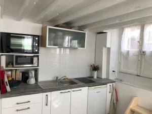 Appartements A 2 pas de la plage : photos des chambres
