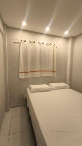 Quarto Duplo com cama extra, banheiro privativo e cozinha