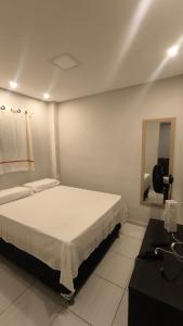 Quarto Duplo com cama extra, banheiro privativo e cozinha