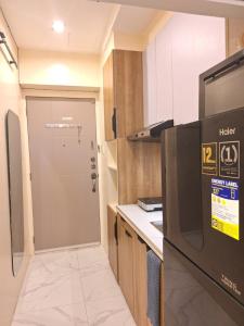 Sky Lux Suite by Elnora at Victoria Sports Tower Kamuning Edsa Southbound