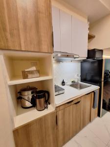 Sky Lux Suite by Elnora at Victoria Sports Tower Kamuning Edsa Southbound