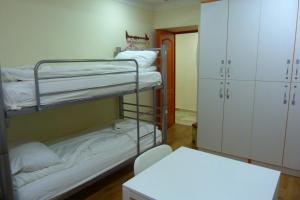 Bed in 8-Bed Mixed Dormitory Room with Shared Bathroom