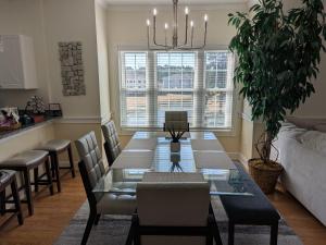 Beautiful 1500 s f 3 Bd - 2 Ba condo overlooking stream and golf course