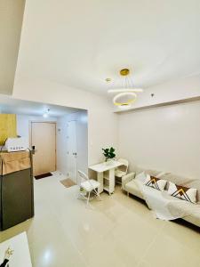 Cozy 1BR Condo at Grass Residences near SM North