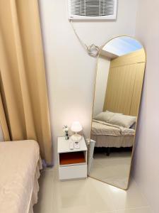 Cozy 1BR Condo at Grass Residences near SM North