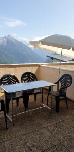 Appartements Appartement Pied des pistes Vue sur les sommets : photos des chambres