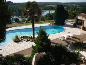 Maisons de vacances Maison avec Piscine - Vue exceptionnelle - Parisot : photos des chambres