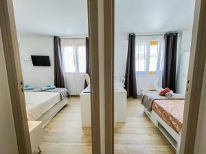 Villas Maison de village climatisee Entre Beziers et Narbonne jusqu-a 5 pers : photos des chambres