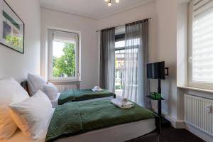 Zentral gelegenes 3 Schlafzimmer - Apartment mit Einzelbetten bis 7 Personen