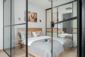 Central Location I Private Garage Parking & Easy Checkin I Cᴏʜᴏsᴛ - 3hvězdičkové hotely ve městě Vilnius